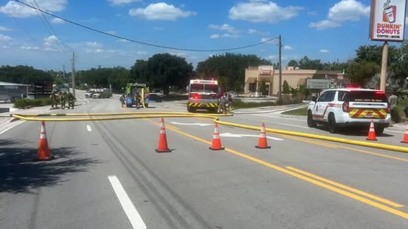 Closed road signs and emergency response near Jensen Beach Boulevard gas line strike