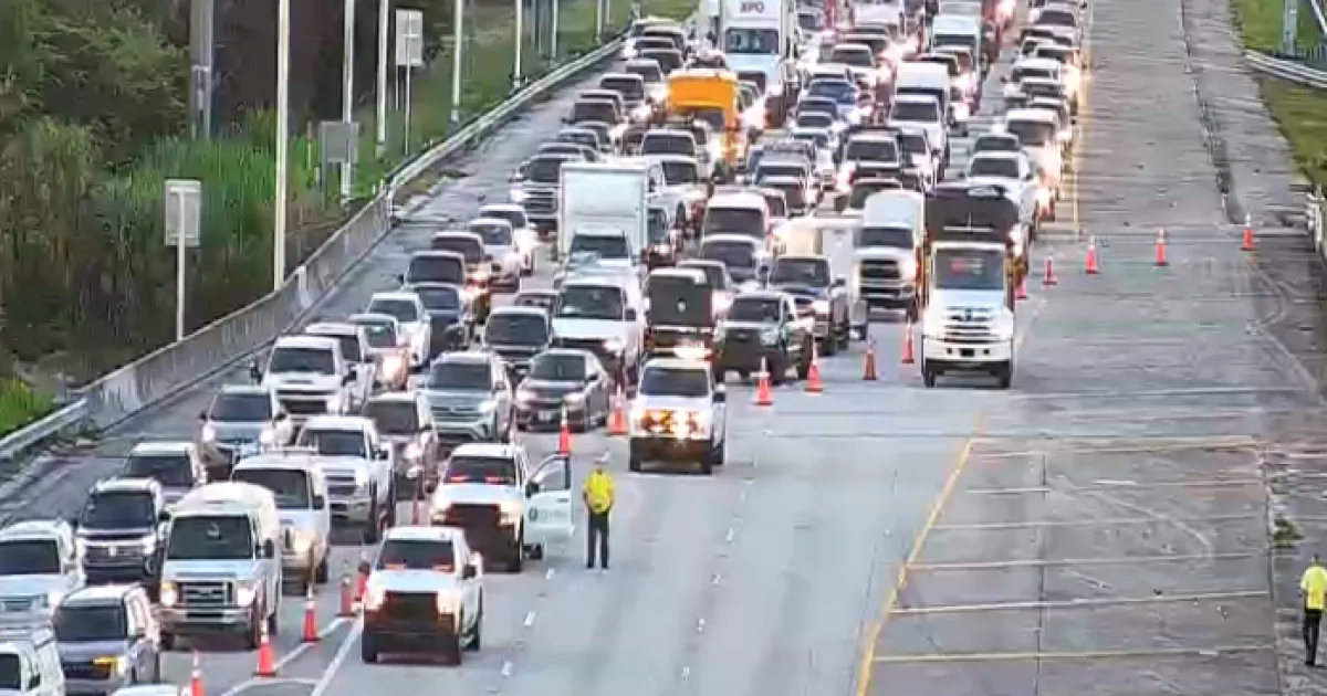 Florida Highway Patrol vehicles at a closed interstate crash scene with traffic blocked