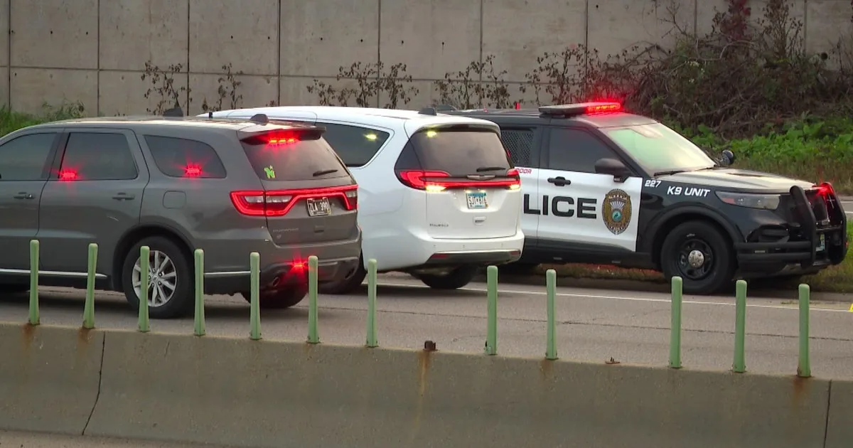 Police investigate a shooting scene on Highway 100 near Highway 7 in St. Louis Park